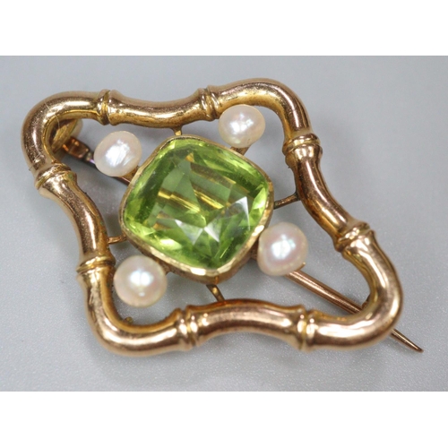 217 - Edwardian 15ct gold pearl and peridot brooch. 3.1 x 2.3cm approx. 4.8g approx.
(B.P. 21% + VAT)