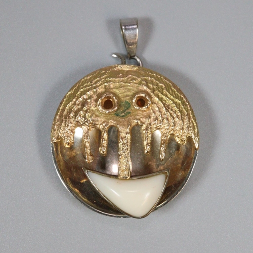 219 - Unusual modernist yellow and white metal Emoji pendant of circular form. Possibly Italian. 3.5cm dia... 