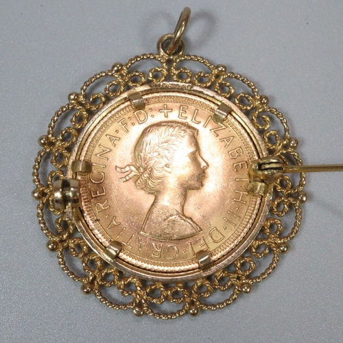 223 - Queen Elizabeth II gold full sovereign in ornate 9ct gold pendant and brooch mount. 12.3g approx.
(B... 