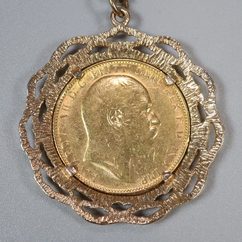 224 - Edward VII gold full sovereign in ornate 9ct mount and 9ct gold fine link chain. 18.8g approx.
(B.P.... 