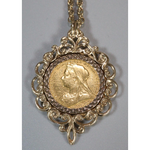 237 - Late Victorian gold half sovereign dated 1900 inset in an ornate 9ct gold pendant mount on a 9ct gol... 