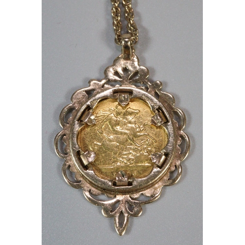 237 - Late Victorian gold half sovereign dated 1900 inset in an ornate 9ct gold pendant mount on a 9ct gol... 