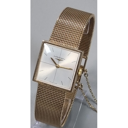 246 - A Longines 9ct Gold  bracelet dress wrist watch, having square face with baton numerals and mesh bra... 