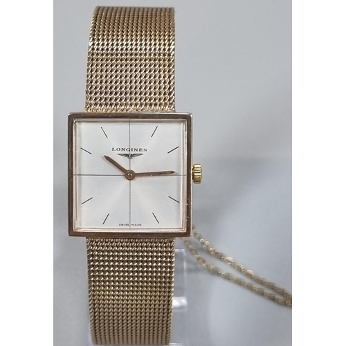 246 - A Longines 9ct Gold  bracelet dress wrist watch, having square face with baton numerals and mesh bra... 