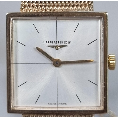 246 - A Longines 9ct Gold  bracelet dress wrist watch, having square face with baton numerals and mesh bra... 