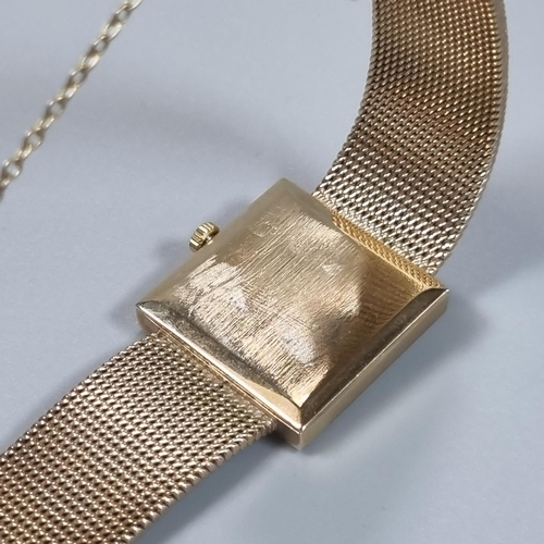 246 - A Longines 9ct Gold  bracelet dress wrist watch, having square face with baton numerals and mesh bra... 