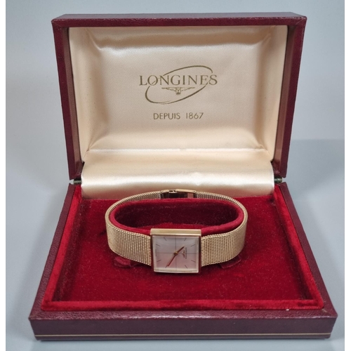 246 - A Longines 9ct Gold  bracelet dress wrist watch, having square face with baton numerals and mesh bra... 