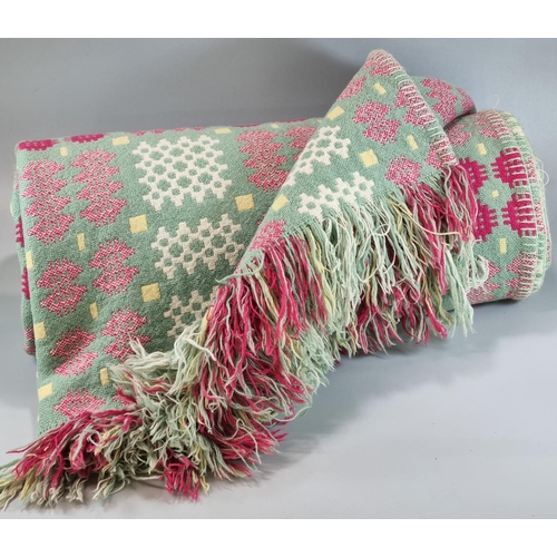 257 - Vintage woollen Welsh tapestry green ground blanket or carthen with fringed edges and traditional Ca... 