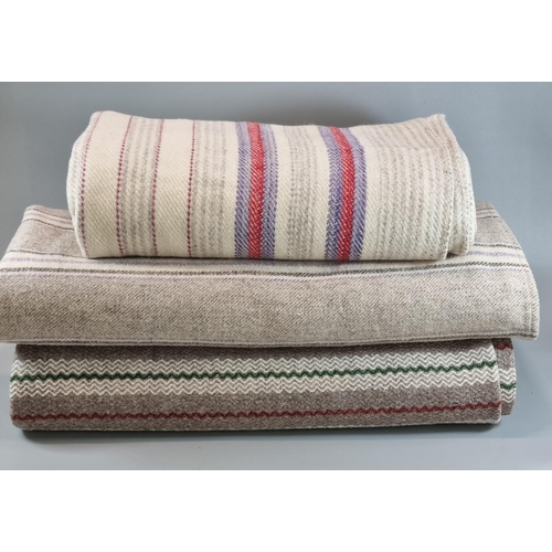 258 - Three antique narrow loom woollen striped blankets. (3)
(B.P. 21% + VAT)