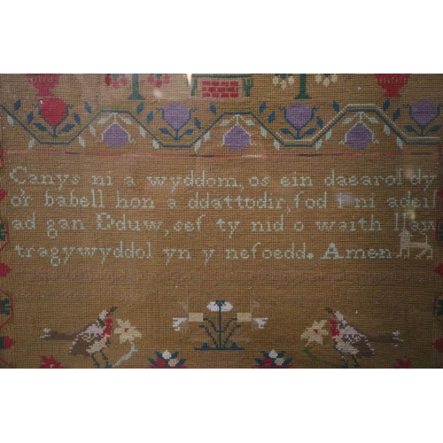 272 - Welsh language tapestry Sampler with Prayer text, birds, flowers and trees. 59x64 cm approx, Framed.... 