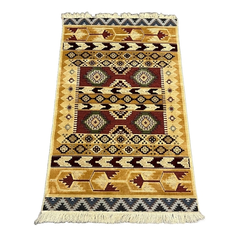 307 - Kelim Aztec design full pile geometric carpet. 172 x 100cm approx.
(B.P. 21% + VAT)