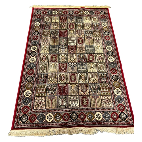 311 - Persian Kashmir full pile rug with multi-coloured garden panel designs. 230 x 160cm approx.
(B.P. 21... 