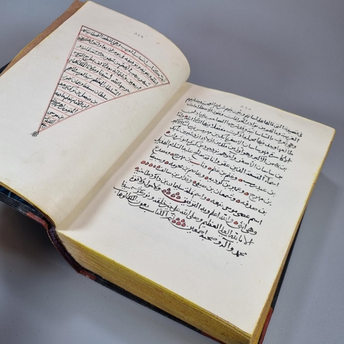 314 - Hand written half Moroccan leather bound Arabic language genealogy. Written in black and red ink. Li... 