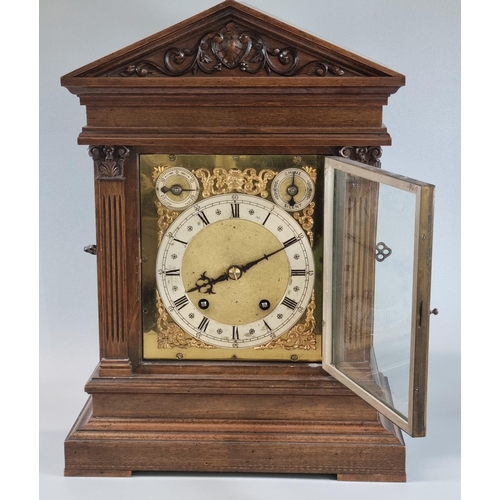 73 - Early 20th Century mahogany cased two train eight day architectural mantel clock in Romanesque style... 