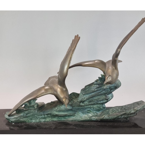 75 - Art Deco design spelter figure group of two gulls with outstretched wings on a rocky outcrop above a... 