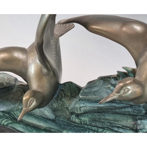 75 - Art Deco design spelter figure group of two gulls with outstretched wings on a rocky outcrop above a... 