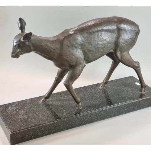 76 - Art Deco design hollow bronze study of a fawn raised on a rectangular granite base. 55cm long approx... 