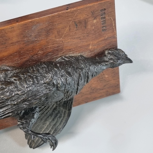 77 - P.J Mene (French 1810-1879), dead pheasant, patinated bronze,, oak panel with name. 19.5cm high appr... 