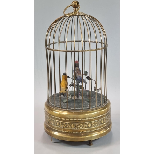 84 - 19th Century brass Singing Birds in a cage, clockwork automaton, containing two brightly coloured bi... 