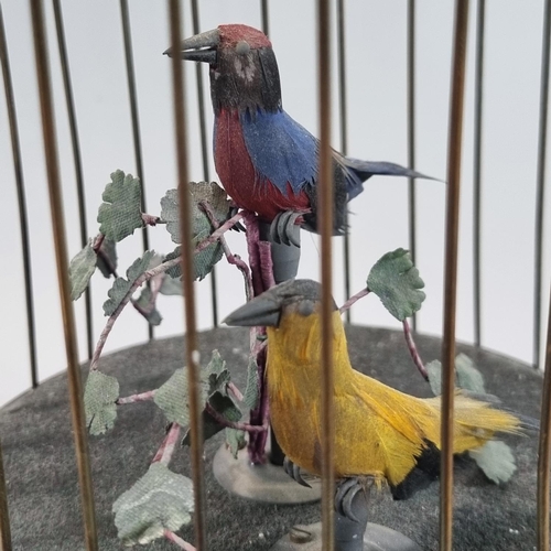 84 - 19th Century brass Singing Birds in a cage, clockwork automaton, containing two brightly coloured bi... 