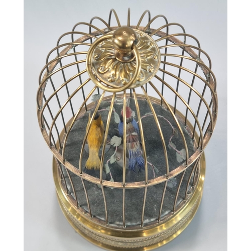 84 - 19th Century brass Singing Birds in a cage, clockwork automaton, containing two brightly coloured bi... 