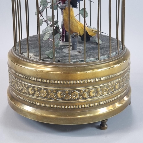 84 - 19th Century brass Singing Birds in a cage, clockwork automaton, containing two brightly coloured bi... 