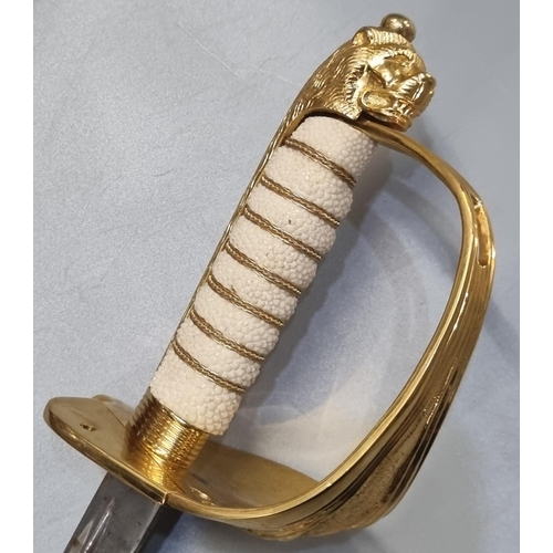 91 - Unusual Royal Navy presentation  mounted sword hilt with shark skin wire bound grip, on an oak stand... 