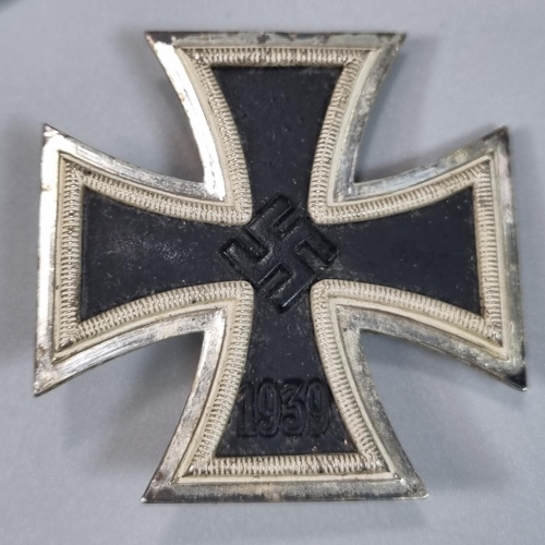 94 - German 2nd World War Iron Cross First Class, a Kriegsmarine High Seas Breast badge, a   Nazi Merit C... 