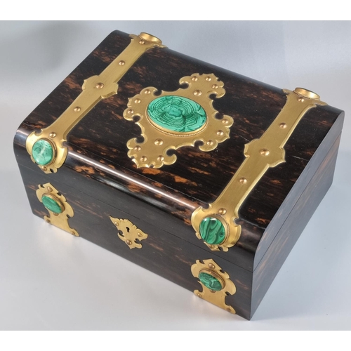 95 - A good quality 19th Century Coromandel gothic design ladies workbox, the case with gilt metal bands ... 