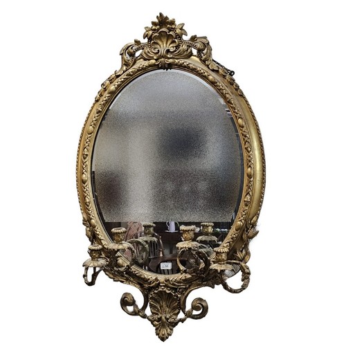 50 - 19th Century gilt gesso framed oval Girandole mirror with shell and scroll work pediment above egg a... 