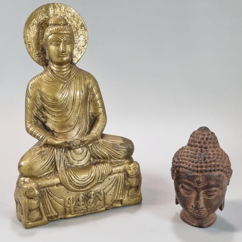 141 - Cast yellow metal Buddha with a halo of enlightenment behind the head, seated in Padmasana, on a pli... 