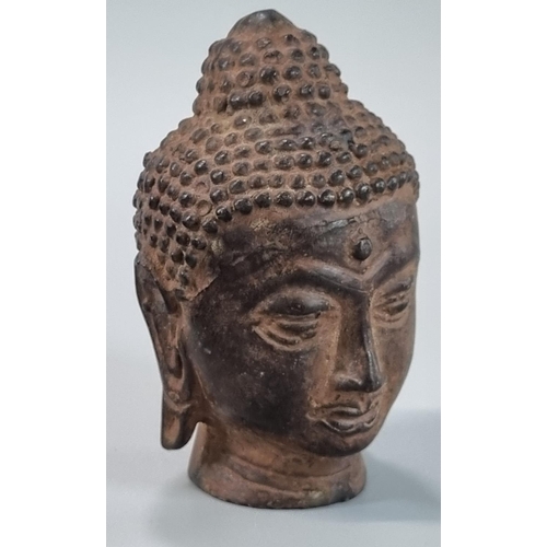 141 - Cast yellow metal Buddha with a halo of enlightenment behind the head, seated in Padmasana, on a pli... 