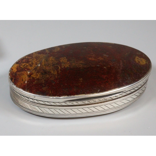 159 - Late 18th/early 19th century moss agate and white metal snuff box, of oval form. 8x4.5cm approx. 
(B... 