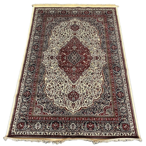 312 - Ivory ground full pile Kashmir rug with traditional floral medallion designs. 230 x 160cm approx.
(B... 