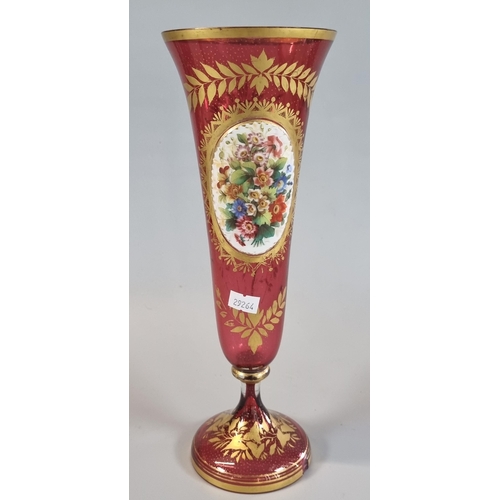 11 - 19th century, probably Bohemian cranberry glass trumpet shaped vase, with gilt floral and foliate de... 