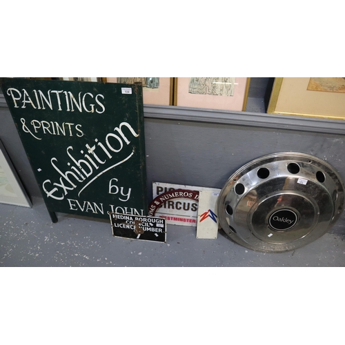 124 - Metal gallery advertising sign 'Paintings and Prints exhibition by Evan John'.  28x40cmn approx. tog... 