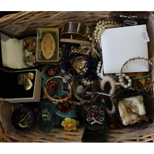 167 - Wicker basket of various jewellery to include: pearls, brooches, necklaces, bangles, bracelets etc. ... 