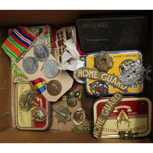 174 - Box of Militaria to include: cap and other badges including Royal Corps, WVS Civil Defence, Home Gua... 