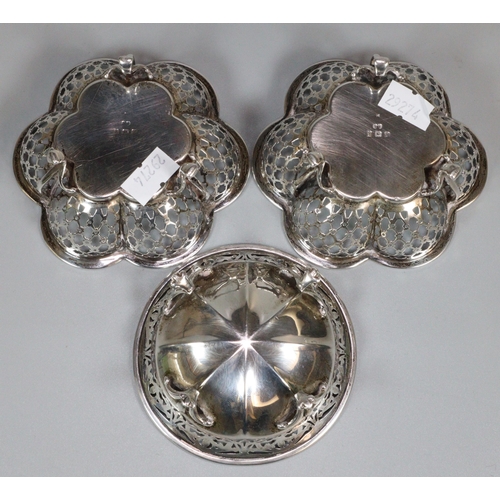 192 - Pair of George V silver pierced bonbon dishes.  Birmingham hallmarks.  3 troy oz approx. together wi... 