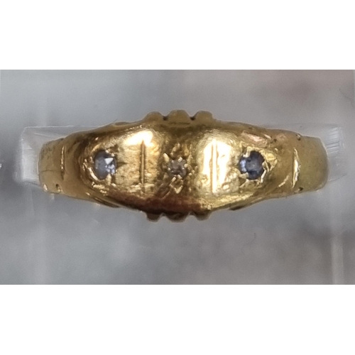 205 - 18ct gold ring inset with three tiny diamond chips.  2.3g approx.  Size O.   (B.P. 21% + VAT)