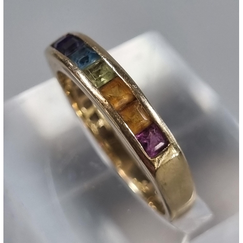 224 - 9ct gold multi-coloured stone dress ring.  3g approx.  Size N.  (B.P. 21% + VAT)