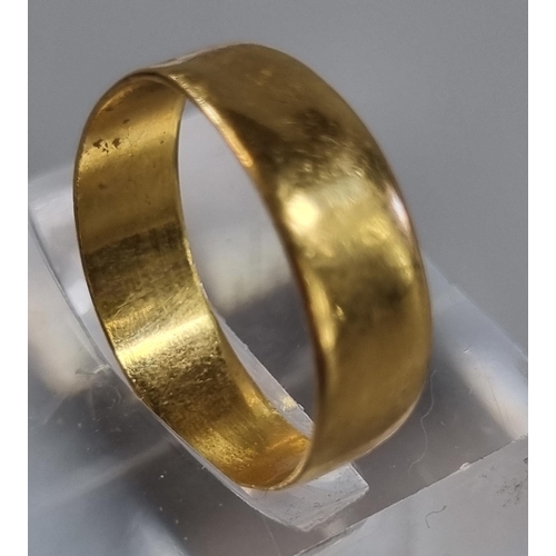 227 - 22ct gold wedding band.  2.1g approx.  size K.   (B.P. 21% + VAT)