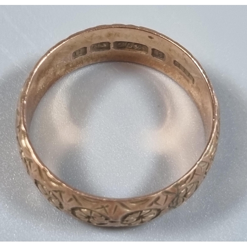 228 - 9ct gold engraved wedding band.  4.3g approx.  Size P.   (B.P. 21% + VAT)