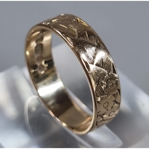 229 - 9ct gold engraved wedding band.  2.1g approx.  Size K1/2.   (B.P. 21% + VAT)