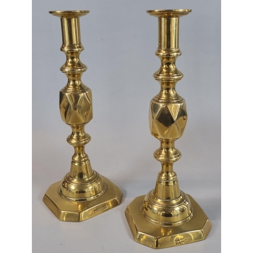 24 - Pair of brass 'The Queen of Diamonds' candlesticks.   (B.P. 21% + VAT)