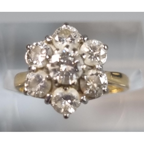 240 - 18ct gold seven stone flower head ring.  3g approx.  Size J.   (B.P. 21% + VAT)