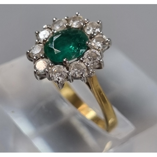 241 - 18ct gold flower head ring with ten diamonds and central emerald stone.  3.2g approx.  Size J.  (B.P... 