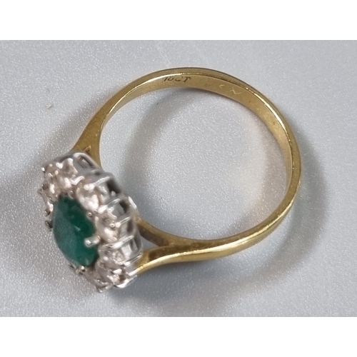 241 - 18ct gold flower head ring with ten diamonds and central emerald stone.  3.2g approx.  Size J.  (B.P... 