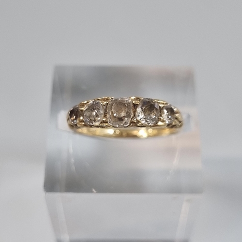 244 - 18ct gold five stone diamond ring.  2.9g approx.  Size I1/2.   (B.P. 21% + VAT)