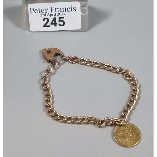 245 - 15ct gold curb link bracelet with 15ct heart shaped padlock and a Spanish gold coin, República de Ch... 